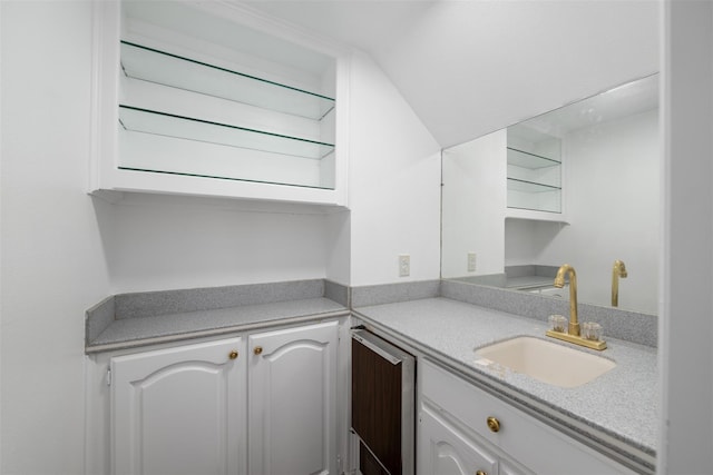 9120 Nob Hill Dr, North Richland Hills, TX 76182 - kitchen featuring a sink, white cabinets, and light countertops