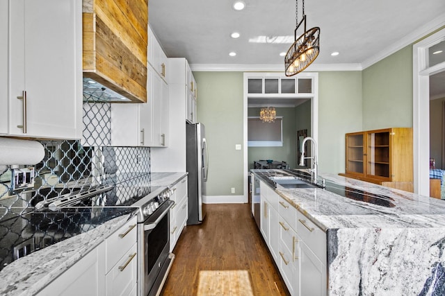 610 W Chestnut St, Denison, TX 75020 - kitchen featuring a sink, stainless steel appliances, recessed lighting, custom exhaust hood, and light stone countertops