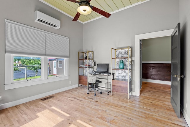 610 W Chestnut St, Denison, TX 75020 - office area featuring a wall unit AC, wood finished floors, ceiling fan, baseboards, and wood ceiling