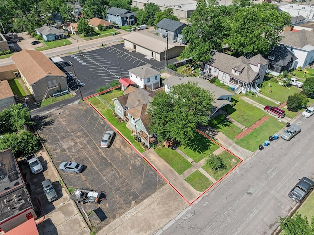 610 W Chestnut St, Denison, TX 75020 - aerial perspective of suburban area with property boundaries highlighted