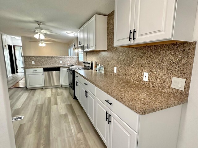 6818 Spring Shower Ct, Krum, TX 76249 - kitchen with electric range oven, stainless steel dishwasher, a ceiling fan, and white cabinets