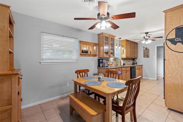 201 Randy Dr, Woodway, TX 76712 - dining room featuring light tile patterned flooring, a ceiling fan, and baseboards