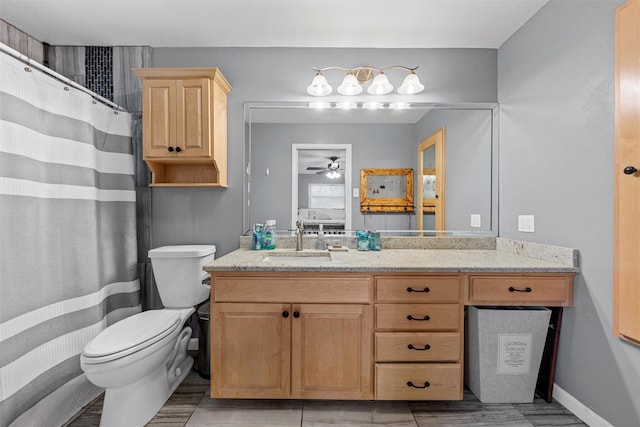 201 Randy Dr, Woodway, TX 76712 - full bath featuring toilet, ceiling fan, vanity, and curtained shower