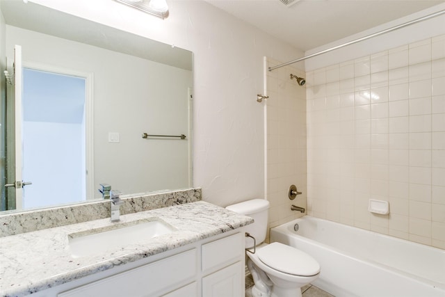 6004 Grand Meadow Ln, Flower Mound, TX 75028 - full bathroom with vanity, toilet, and bathtub / shower combination