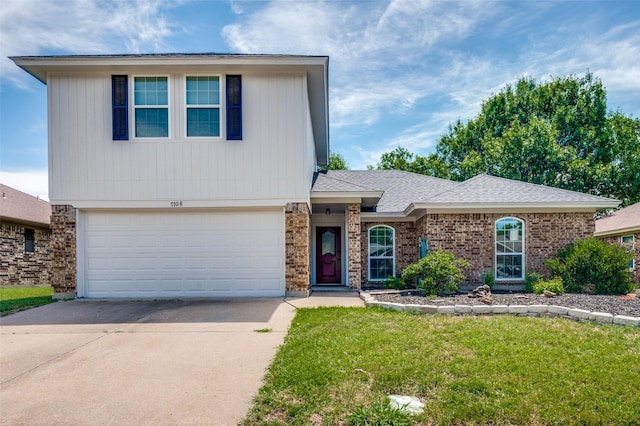 7708 Partridge Dr, Watauga, TX 76148 - view of front of house featuring concrete driveway, a front lawn, an attached garage, and brick siding