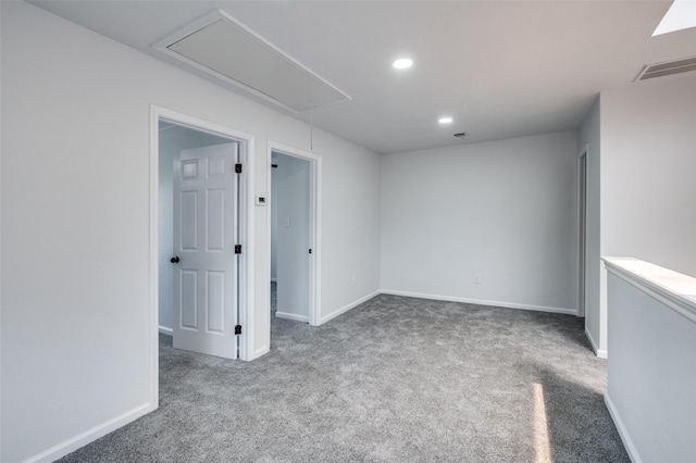 7708 Partridge Dr, Watauga, TX 76148 - empty room with attic access, carpet flooring, recessed lighting, and baseboards