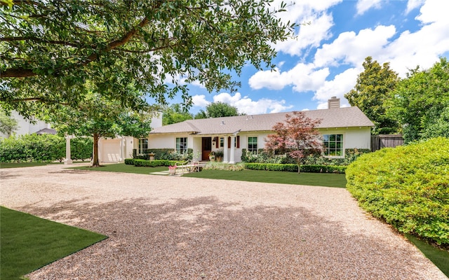 4407 Ridge Rd, Dallas, TX 75229 - ranch-style home featuring a chimney, a garage, driveway, and stucco siding