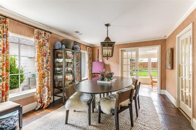 4407 Ridge Rd, Dallas, TX 75229 - dining area featuring french doors, hardwood / wood-style floors, baseboards, wallpapered walls, and ornamental molding