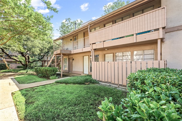 10578 High Hollows Dr Unit 166, Dallas, TX 75230 - view of building exterior with stairs