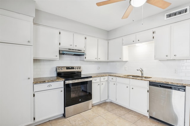 10578 High Hollows Dr Unit 166, Dallas, TX 75230 - kitchen with appliances with stainless steel finishes, under cabinet range hood, a sink, light stone counters, and decorative backsplash