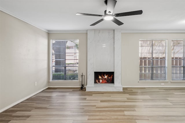 10578 High Hollows Dr Unit 166, Dallas, TX 75230 - unfurnished living room with ornamental molding, wood finished floors, a fireplace, baseboards, and ceiling fan