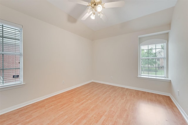 9122 Bottlebrush Ln, Irving, TX 75063 - empty room featuring light wood-style floors, baseboards, and ceiling fan