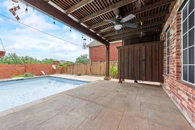 9122 Bottlebrush Ln, Irving, TX 75063 - view of pool with a ceiling fan, a fenced backyard, and a patio area