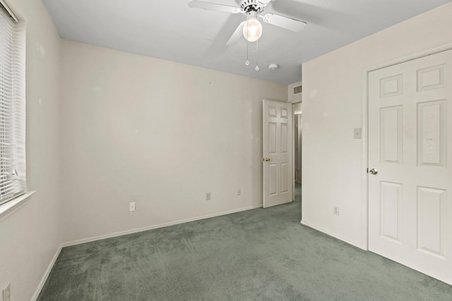 4006 Fletcher Dr, Garland, TX 75044 - unfurnished bedroom featuring carpet floors, baseboards, and ceiling fan