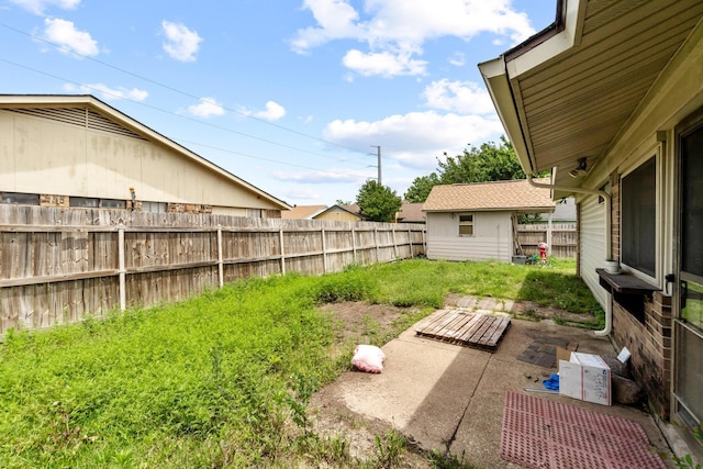 4006 Fletcher Dr, Garland, TX 75044 - fenced backyard with an outbuilding
