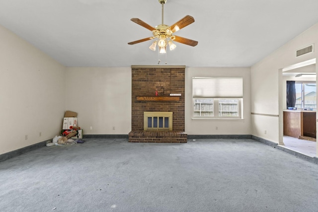 4006 Fletcher Dr, Garland, TX 75044 - unfurnished living room featuring carpet, a ceiling fan, a brick fireplace, and baseboards