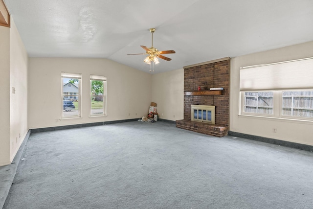 4006 Fletcher Dr, Garland, TX 75044 - unfurnished living room with a ceiling fan, carpet floors, a brick fireplace, lofted ceiling, and baseboards