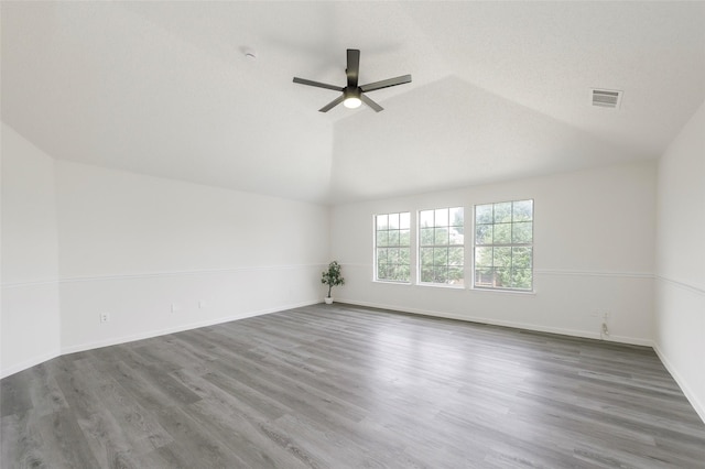 811 Chittamwood Ln, Allen, TX 75002 - empty room featuring vaulted ceiling, a ceiling fan, wood finished floors, and baseboards