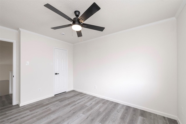 811 Chittamwood Ln, Allen, TX 75002 - unfurnished bedroom featuring light wood finished floors, crown molding, baseboards, and a ceiling fan
