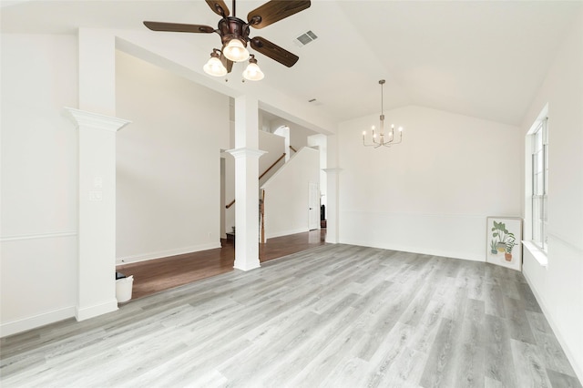 811 Chittamwood Ln, Allen, TX 75002 - unfurnished living room with a ceiling fan, lofted ceiling, light wood-style floors, stairs, and a chandelier