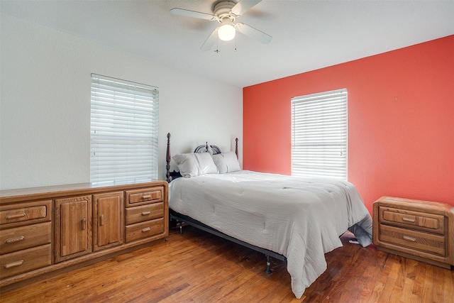 515 Euclid St, Cleburne, TX 76033 - bedroom with light wood-style flooring and ceiling fan