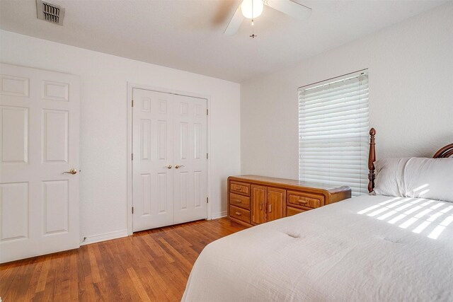 515 Euclid St, Cleburne, TX 76033 - bedroom featuring light wood-type flooring, baseboards, ceiling fan, and a closet