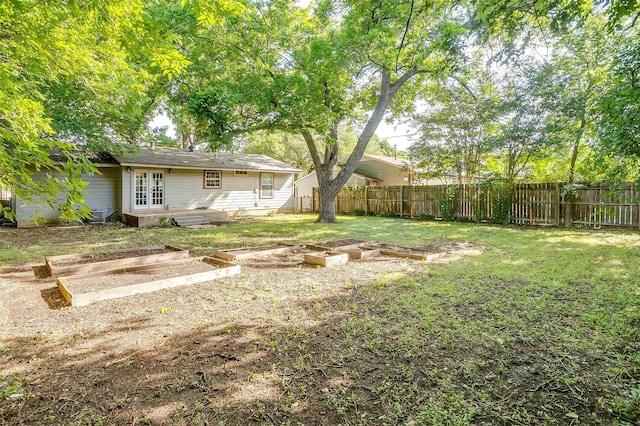 515 Euclid St, Cleburne, TX 76033 - view of yard with a garden and french doors