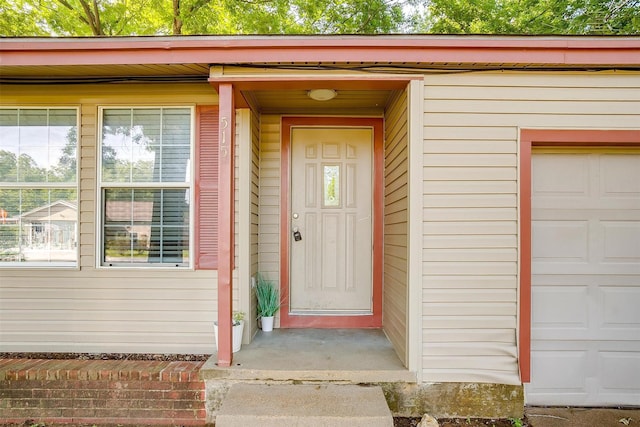 515 Euclid St, Cleburne, TX 76033 - doorway to property featuring an attached garage