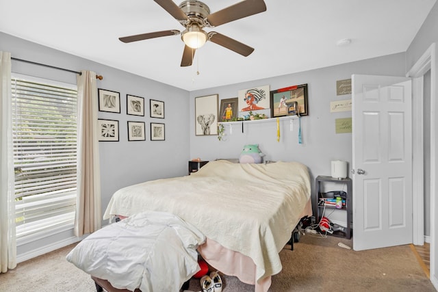 5340 Bourquin St, Dallas, TX 75210 - carpeted bedroom with a ceiling fan