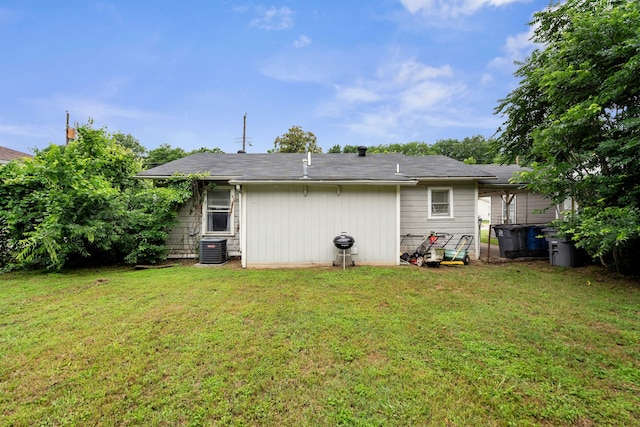 5340 Bourquin St, Dallas, TX 75210 - back of property with central AC unit and a yard