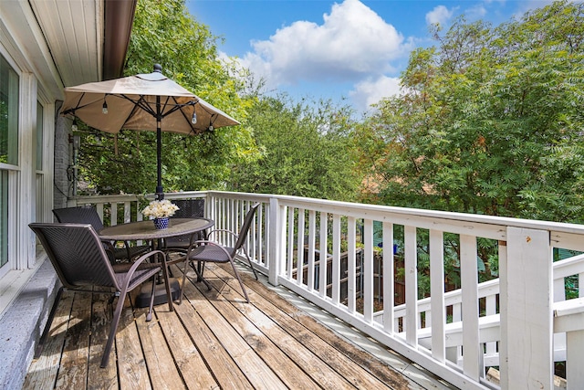 4742 Victor St, Dallas, TX 75246 - wooden deck with outdoor dining space