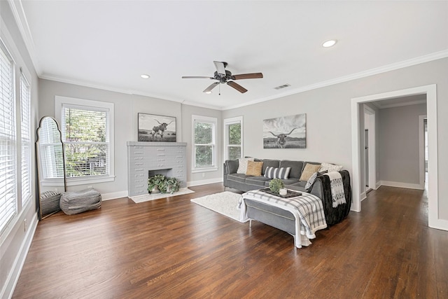 4742 Victor St, Dallas, TX 75246 - living room featuring healthy amount of natural light, a fireplace, a ceiling fan, baseboards, and ornamental molding