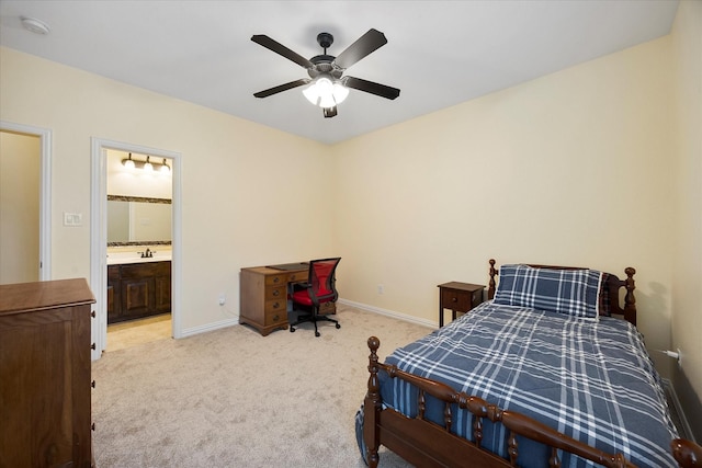 123 Deverson Dr, Rockwall, TX 75087 - bedroom with light colored carpet, baseboards, connected bathroom, a sink, and a ceiling fan