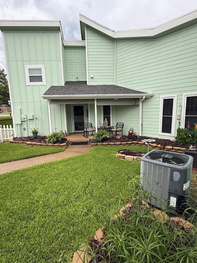 628 Harbor Cir, Azle, TX 76020 - view of front of house featuring board and batten siding and cooling unit
