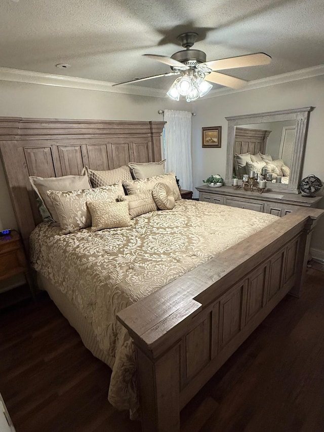 628 Harbor Cir, Azle, TX 76020 - bedroom featuring dark wood finished floors, a textured ceiling, a ceiling fan, and ornamental molding
