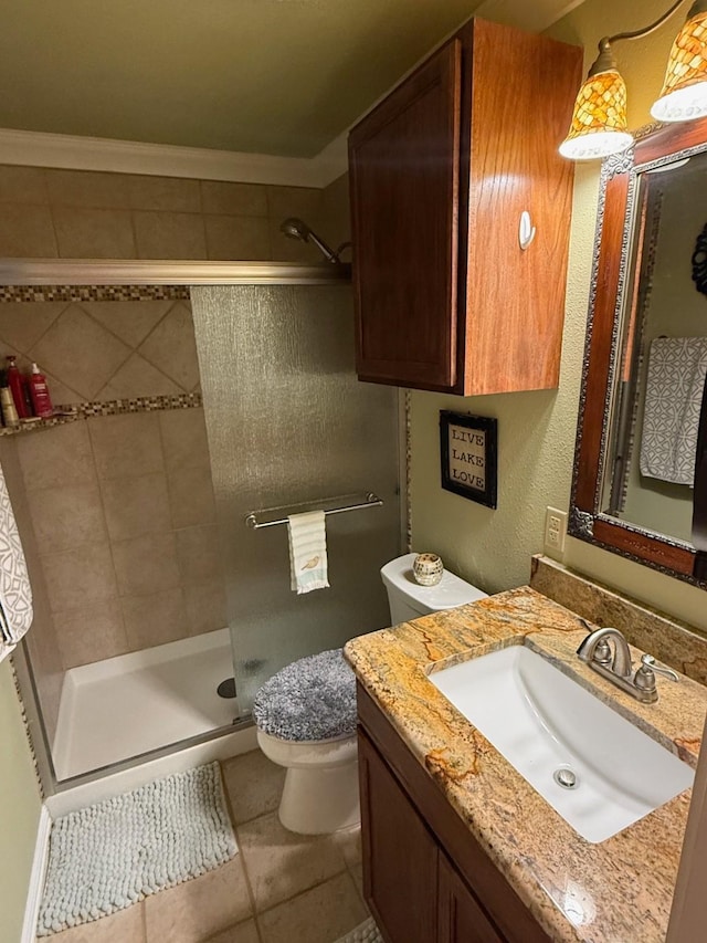 628 Harbor Cir, Azle, TX 76020 - bathroom featuring a stall shower, vanity, toilet, and tile patterned floors