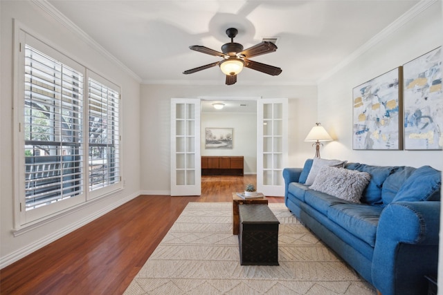 1205 Cross Timber Dr, Southlake, TX 76092 - living room featuring french doors, healthy amount of natural light, wood finished floors, a ceiling fan, and ornamental molding