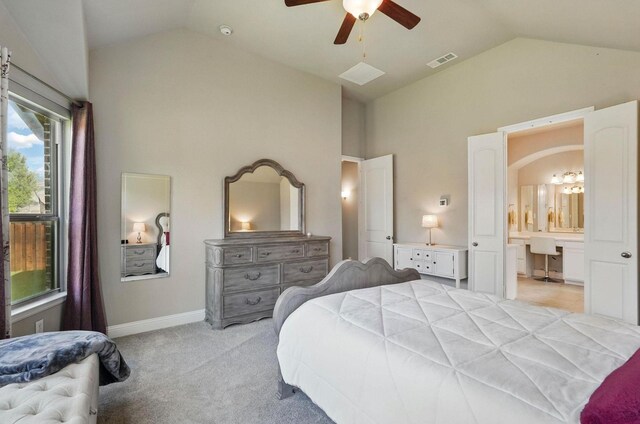 7817 Fossil Creek Trl, Mckinney, TX 75071 - bedroom with vaulted ceiling, light colored carpet, baseboards, ensuite bath, and ceiling fan