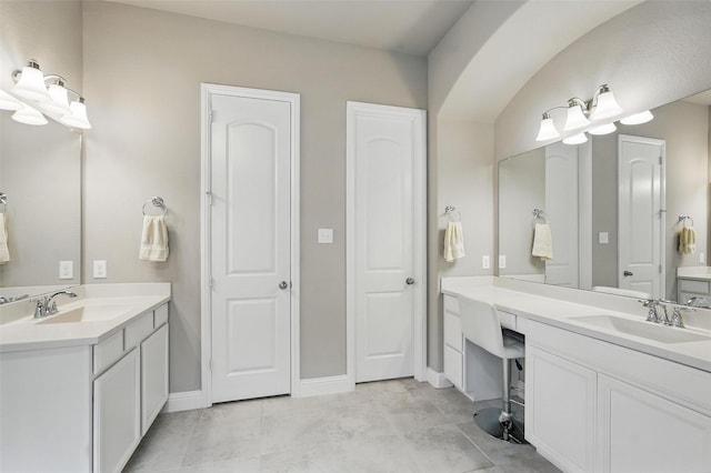 7817 Fossil Creek Trl, Mckinney, TX 75071 - full bath with two vanities, baseboards, and tile patterned floors