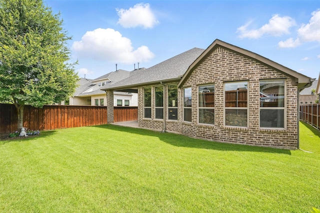 7817 Fossil Creek Trl, Mckinney, TX 75071 - rear view of house with brick siding and a shingled roof