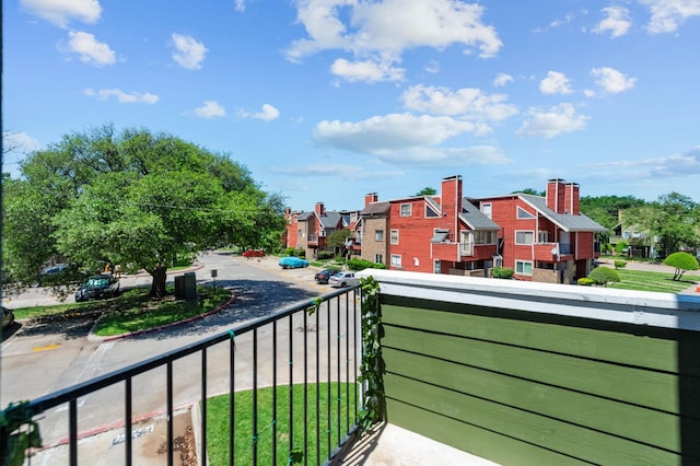 9815 Walnut St Unit 204, Dallas, TX 75243 - balcony featuring a residential view