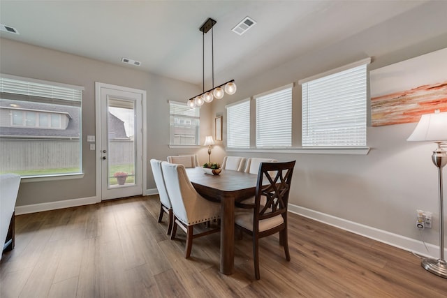 2208 Clancy Dr, Northlake, TX 76247 - dining area featuring baseboards and wood finished floors