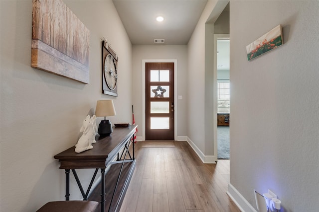 2208 Clancy Dr, Northlake, TX 76247 - entrance foyer featuring wood finished floors and baseboards
