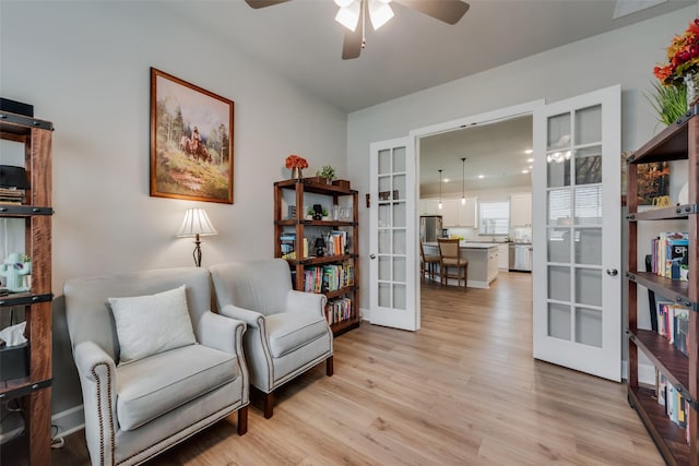 2208 Clancy Dr, Northlake, TX 76247 - living area featuring french doors, light wood-style flooring, and a ceiling fan