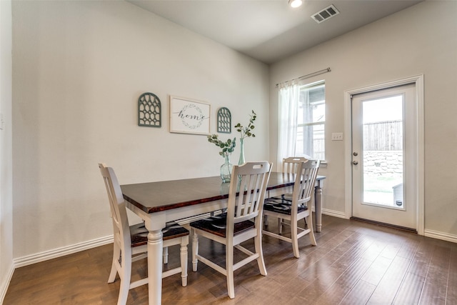 1312 Hutchings Ct, Celina, TX 75009 - dining room with healthy amount of natural light, wood finished floors, and baseboards