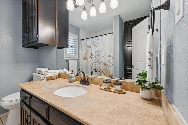 4109 Three Oaks Dr, Arlington, TX 76016 - bathroom featuring toilet, vanity, and curtained shower