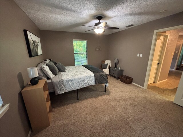 4109 Three Oaks Dr, Arlington, TX 76016 - bedroom with a textured ceiling, carpet, ceiling fan, and baseboards
