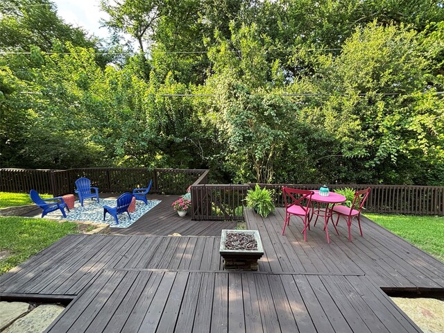 4109 Three Oaks Dr, Arlington, TX 76016 - wooden terrace featuring an outdoor fire pit and outdoor dining area