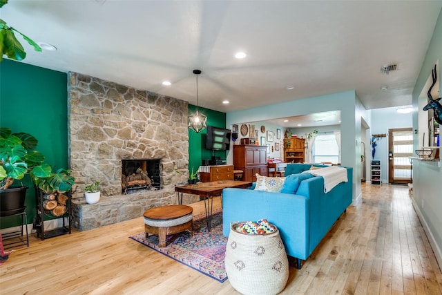 3964 Lost Creek Dr, Dallas, TX 75224 - living area featuring hardwood / wood-style flooring, a fireplace, and recessed lighting