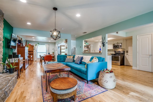 3964 Lost Creek Dr, Dallas, TX 75224 - living area with light wood-type flooring and recessed lighting